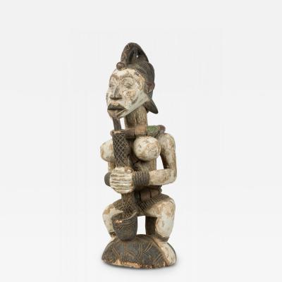 African Southern Nigeria Mid Century Carved Painted Wood Seated Female Anjenu