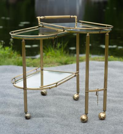 Aldo Tura Italian Hollywood Regency Brass and Glass Three Tier Pivoting or Swivel Bar Cart
