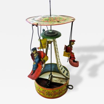 American Tin Toy Clockwork Carousel Circa 1895