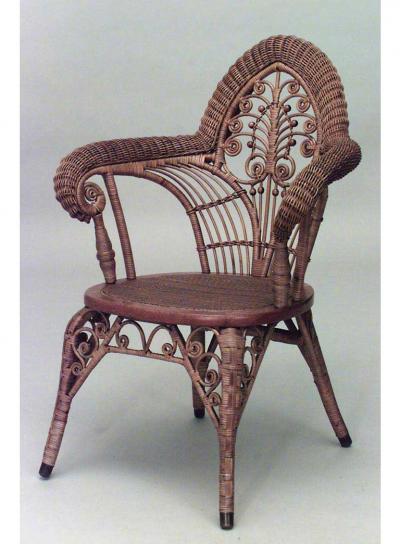 American Victorian natural wicker arm chair with woven roll arms