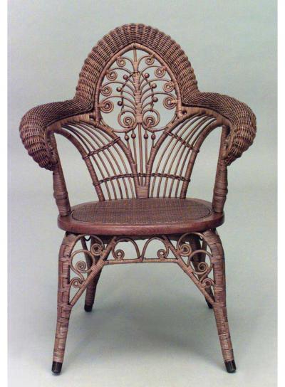American Victorian natural wicker arm chair with woven roll arms