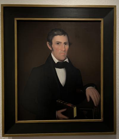 Ammi Phillips Portrait of A Gentleman holding a book of Wesley s sermons