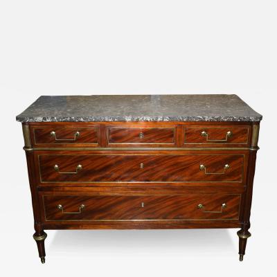 An 18th Century French Louis XVI Brass Mounted Mahogany Commode