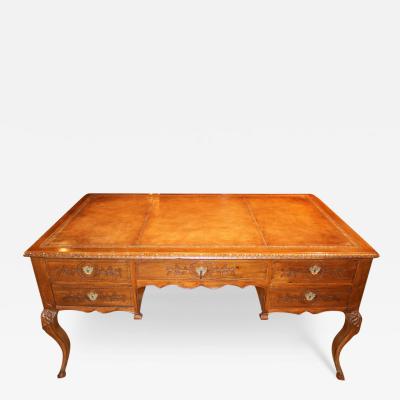 An 18th Century French Provincial R gence Walnut Partners Desk