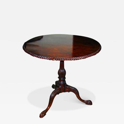 An 18th Century Irish Mahogany Round Tilt Top Table