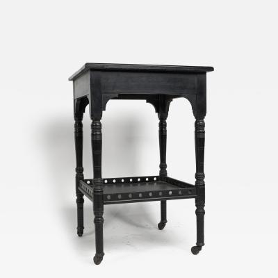 An Aesthetic Movement Ebonized Walnut Two tier Side Table