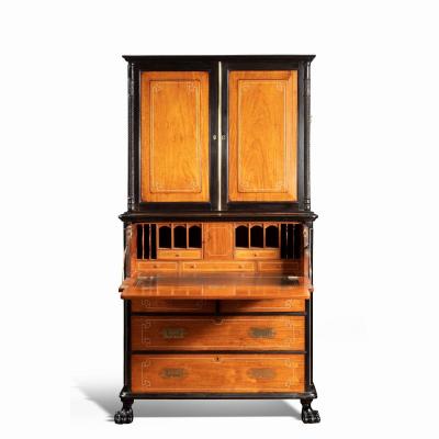 An Anglo Chinese camphor and ebony campaign secretaire bookcase