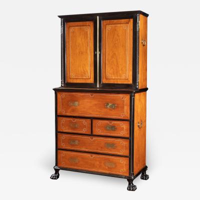 An Anglo Chinese camphor and ebony campaign secretaire bookcase