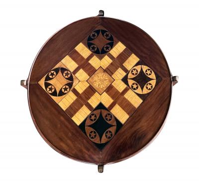 An Anglo Indian Circular Inlaid Game Table with Hinged Flip Top