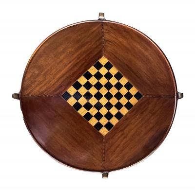 An Anglo Indian Circular Inlaid Game Table with Hinged Flip Top