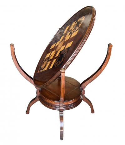 An Anglo Indian Circular Inlaid Game Table with Hinged Flip Top