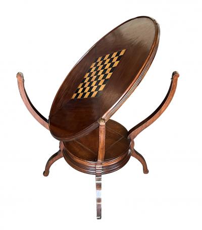 An Anglo Indian Circular Inlaid Game Table with Hinged Flip Top