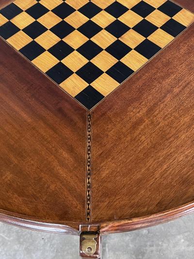 An Anglo Indian Circular Inlaid Game Table with Hinged Flip Top