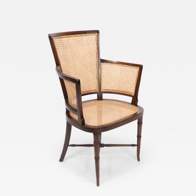 An Anglo Japanese Cane Work Armchair