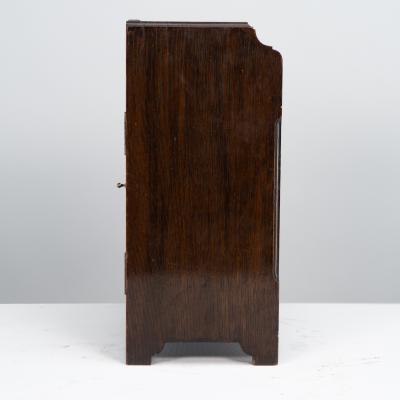 An Anglo Japanese Carved Oak Mantel Clock with Hand Painted Blue Floral Dial