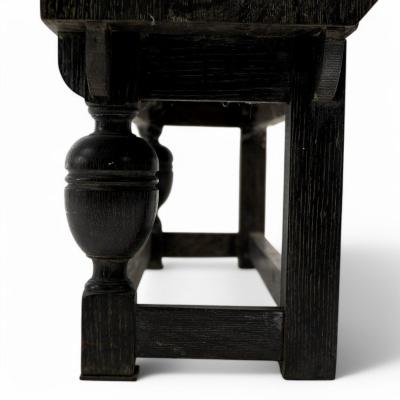An Art Deco Dark Limed Oak Glazed Bookcase with Carved Floral Decoration