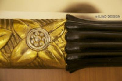 An Art Deco Inspired Gilt and Ebonized Oval Mirror by ILIAD Design