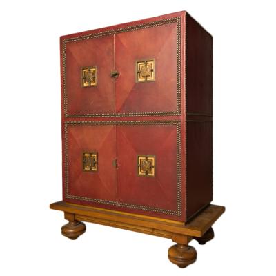 An Art Deco cabinet in deep red leather by M Claude Renard circa 1930 