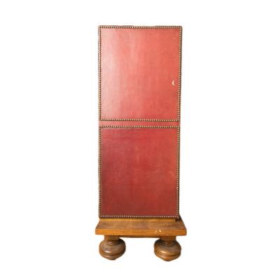 An Art Deco cabinet in deep red leather by M Claude Renard circa 1930 