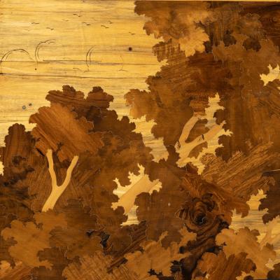 An Art Deco marquetry panel of a jaguar