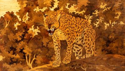 An Art Deco marquetry panel of a jaguar