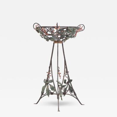 An Art Nouveau style iron plant stand C 1950 