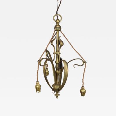 An Arts Crafts Brass Three Arm Ceiling Light