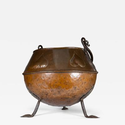 An Arts Crafts Copper Coal Bucket with Stylized Heart Decoration