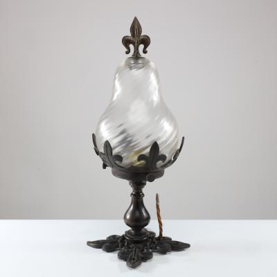 An Arts and Crafts Gothic patinated bronze ceiling light