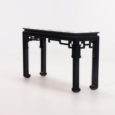 An Asian style marble top ebonized console table circa 1950 