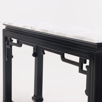 An Asian style marble top ebonized console table circa 1950 