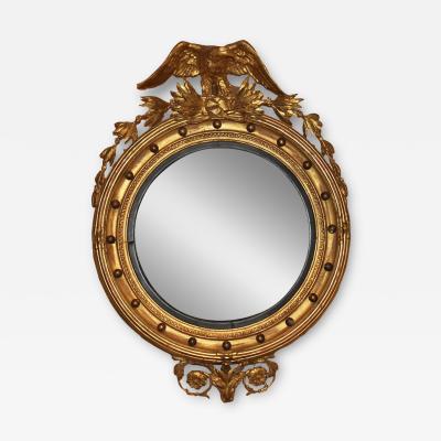 An Early 19th Century English Regency Giltwood Convex Mirror