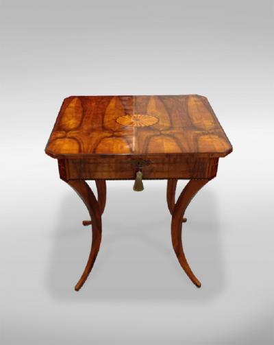 An Elegant Biedermeier Single Drawer Sewing Table