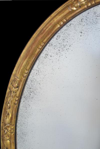 An Elegant Pair of French Napoleon III Carved Gilt Wood Oval Mirrors