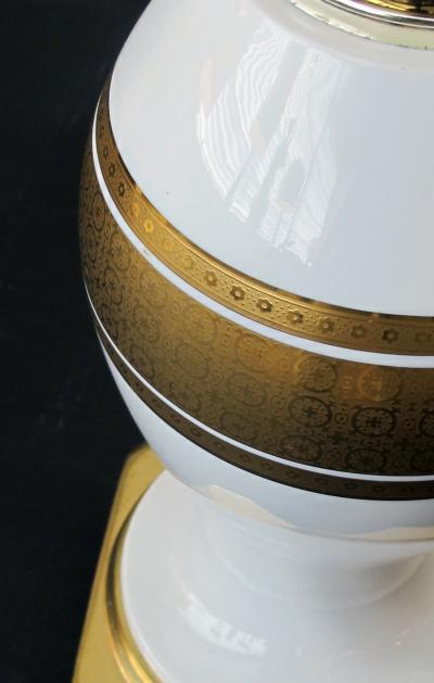 An Elegant Pair of German White Porcelain Lamps with Gilt Decoration