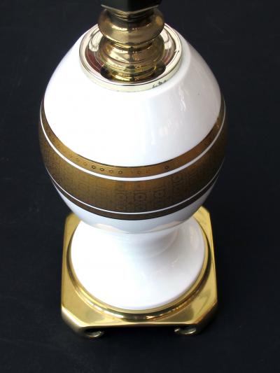 An Elegant Pair of German White Porcelain Lamps with Gilt Decoration
