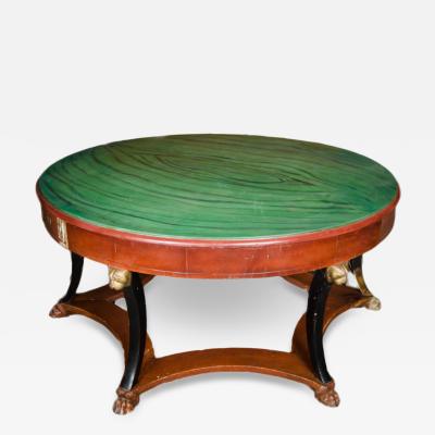 An Empire style round center library table late 19thC