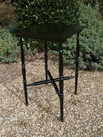 An English Aesthetic Movement Ebonized Occasional Table