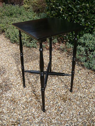 An English Aesthetic Movement Ebonized Occasional Table
