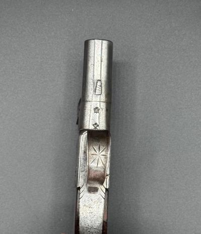 An English Flintlock Screwbarrel Boxlock Pistol