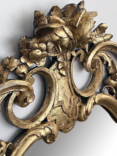 An English George II Style Cartouche shaped Giltwood Mirror with Ho Ho Birds