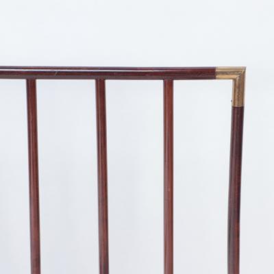 An English brass mounted mahogany campaign bed circa 1900 