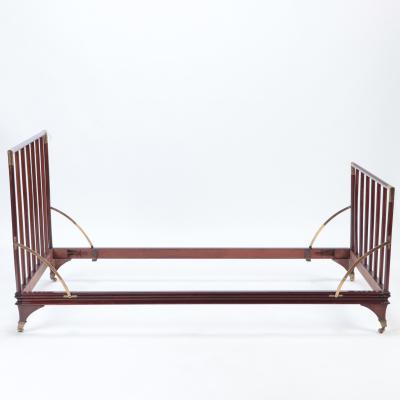 An English brass mounted mahogany campaign bed circa 1900 