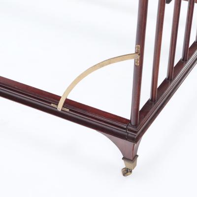 An English brass mounted mahogany campaign bed circa 1900 