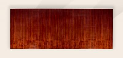 An Extendable Dining Table with Fluted Base by Iliad Design