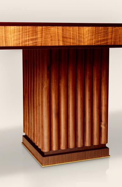 An Extendable Dining Table with Fluted Base by Iliad Design