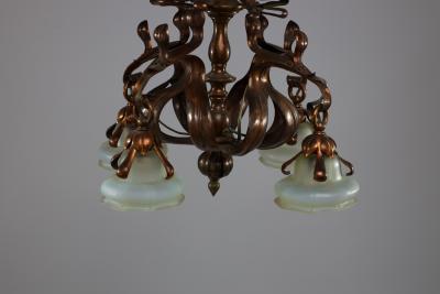 An Impressive Arts Crafts Copper Chandelier with Original Vaseline Shades