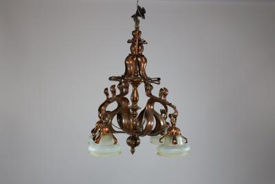 An Impressive Arts Crafts Copper Chandelier with Original Vaseline Shades