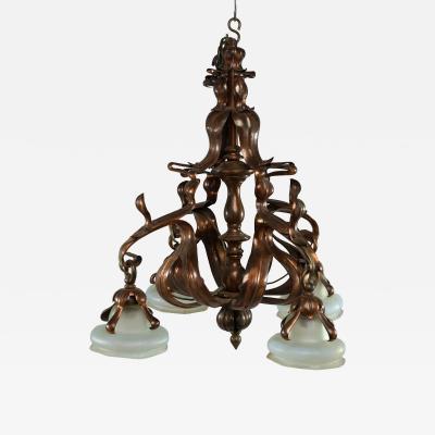 An Impressive Arts Crafts Copper Chandelier with Original Vaseline Shades