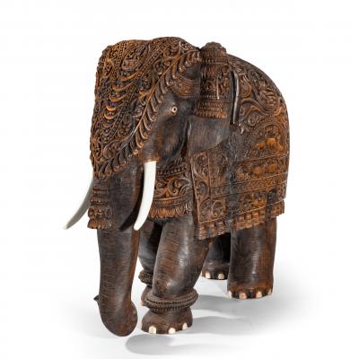 An Indian carved hardwood elephant